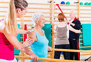 pictures of senior citizens exercising, with a trainer, in gym pictures of senior citizens exercising, with a trainer, in gym